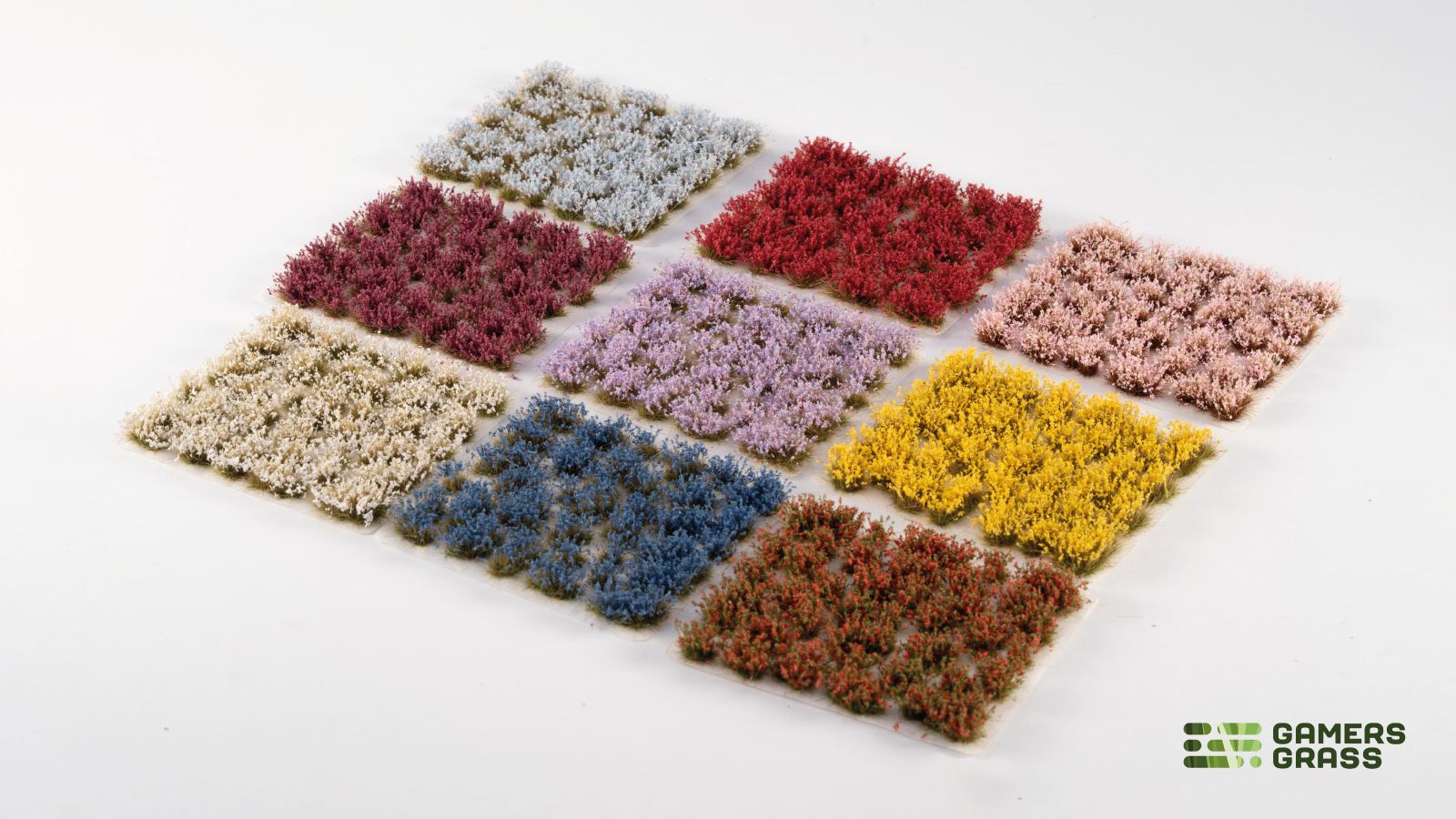 Gamers Grass Flowers Core Set flower tufts in assorted colors arranged in rows