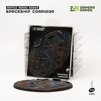 Gamers Grass packaging and massive 170mm oval Spaceship Corridor base displayed on white background

