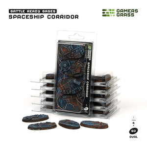 Gamers Grass packaging and four painted 60mm oval Spaceship Corridor bases displayed on white background
