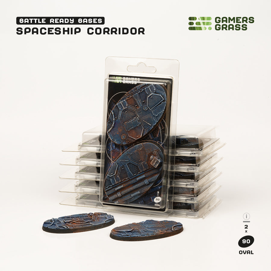 Gamers Grass packaging and two painted 90mm oval Spaceship Corridor bases displayed on white background
