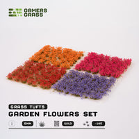 Contents of the Garden Flowers Set, displaying violet, orange, red, and pink flower tufts
