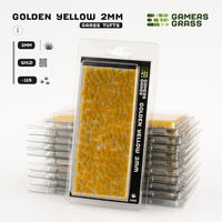 Gamers Grass Golden Yellow 2mm Tufts packaging, showcasing vibrant yellow grass and fantastical scene imagery
