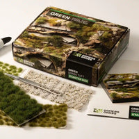 Gamers Grass Green Grass Tuft Starter Box packaging, featuring lush landscape imagery and kit contents