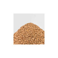 Fine cork grit granules close-up showing the 0.5-2mm grain and texture

