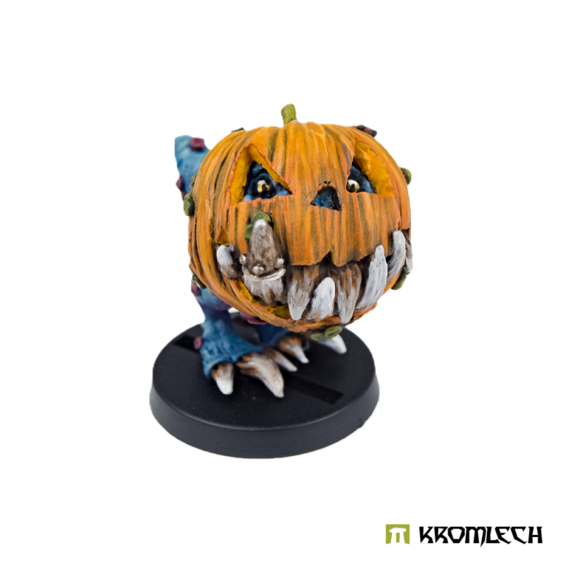 Kromlech Halloween Pumpkin Gnaw painted resin miniature on its 25 mm round base, front view, fangs and eyes in the pumpkin