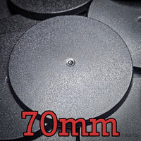 70mm round base for Warhammer miniatures on white background
