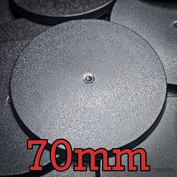 70mm round base for Warhammer miniatures on white background