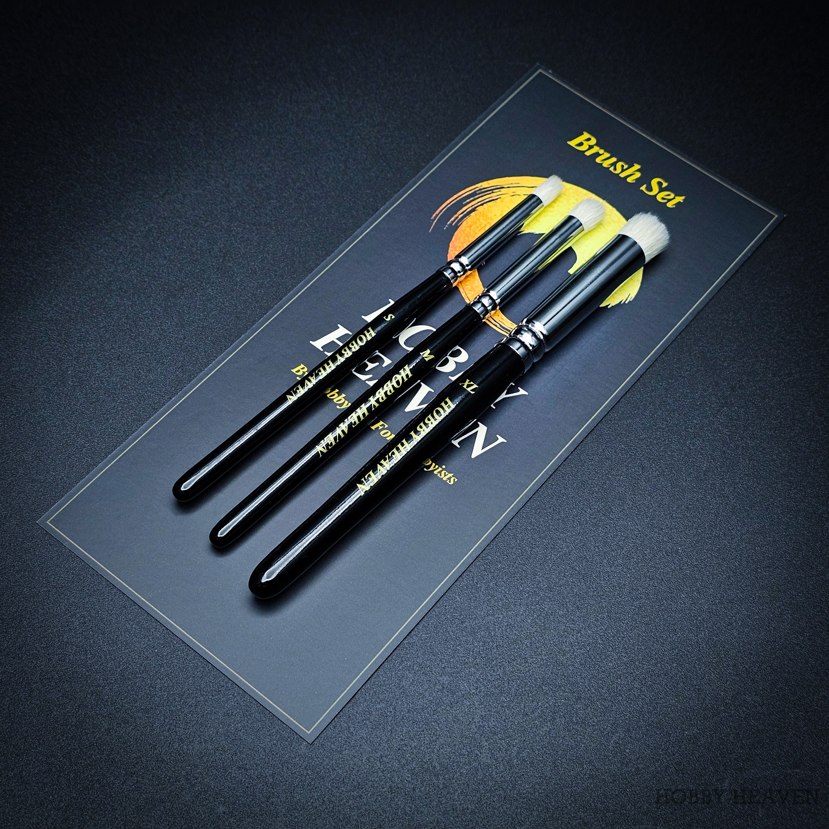 Hobby Heaven 3-piece dry brush set displayed on branded backing card before packaging.