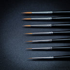 Close up of Hobby Heaven Series 3 Kolinsky Sable brush tips showing fine pointed detail
