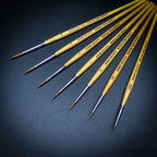 Series 4 Kolinsky Sable complete size range — sizes 000 to 4 with natural birch handles on dark background
