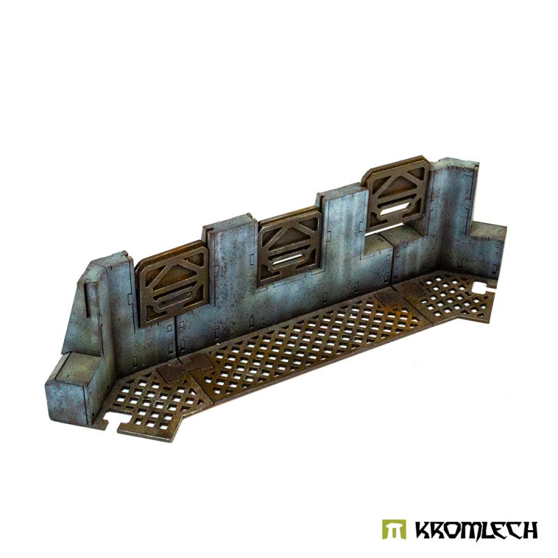 Inside the painted 45° wall set: window plates over a grated walkway that follows the bend