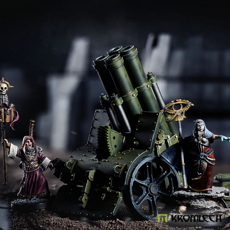 Kromlech Heavy Quad Cannon on a dark battlefield with its barrels raised, painted robed figures standing beside it