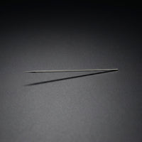 Iwata N5 0.5mm precision-ground stainless steel airbrush needle close-up
