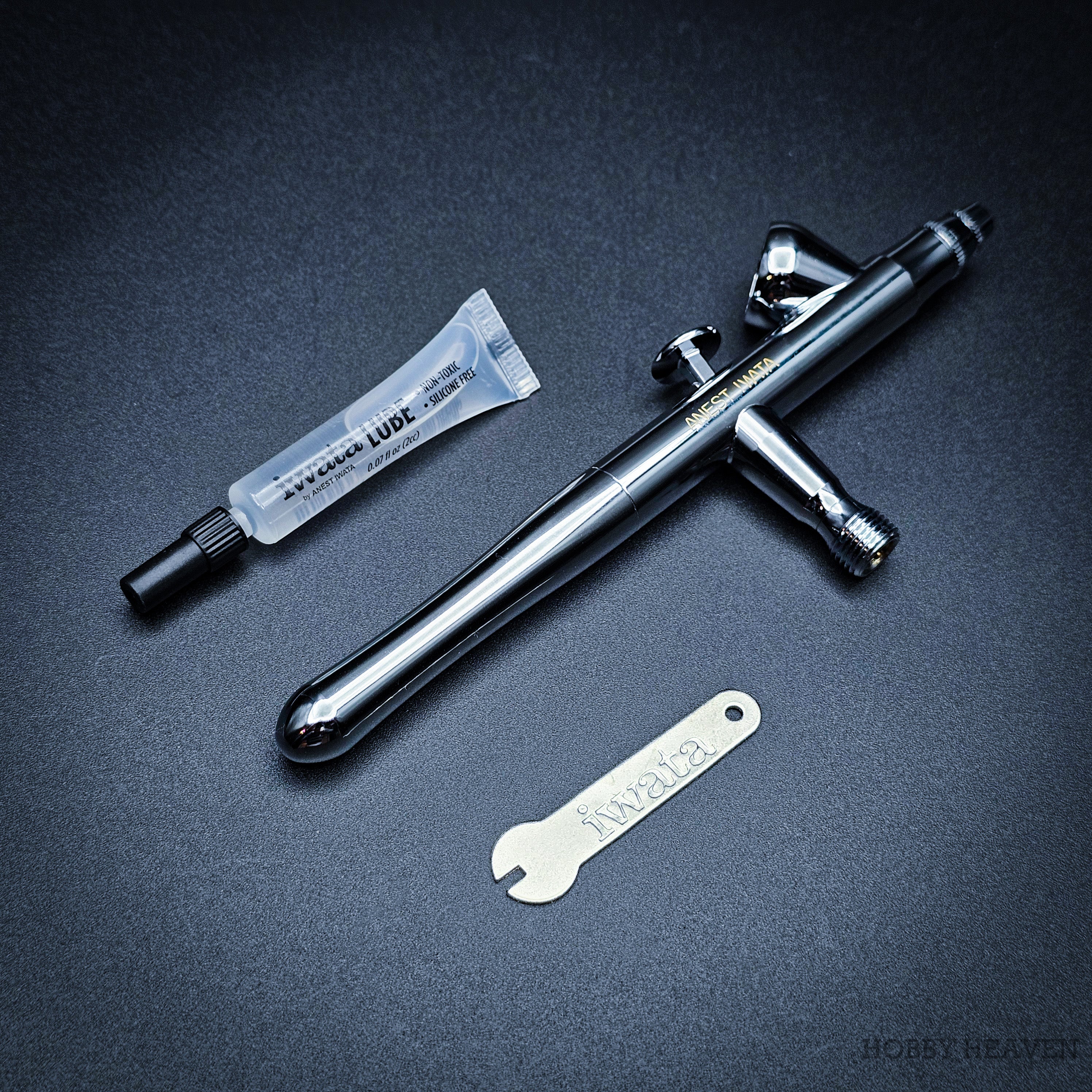Iwata Revolution BR airbrush with Iwata Lube and nozzle spanner included in the set