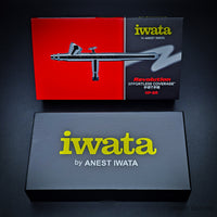 Iwata Revolution BR airbrush retail packaging front with Anest Iwata branding
