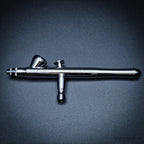 Side view of Iwata Revolution BR airbrush showing engraved model markings