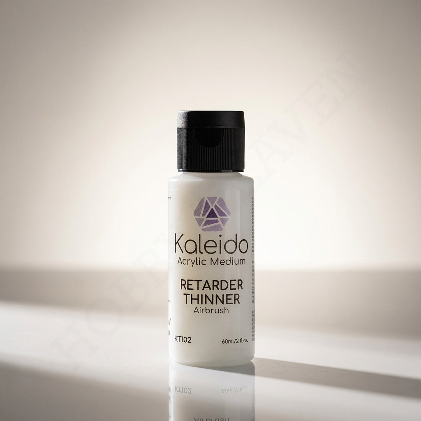 Kaleido Colorworks KT102 retarder thinner 60ml bottle on warm lit reflective surface