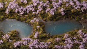 Gamers Grass Lavender Flowers tufts applied to a diorama with water and vegetation