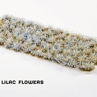 Close-up sheet of GamersGrass Light Blue Lilac Flowers – 75 tufts in assorted sizes for hobby basing and scenery