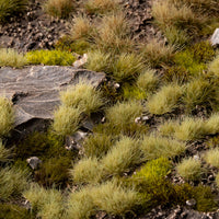 Vibrant diorama featuring Light Green 4mm - Small Tufts, showcasing a lush spring meadow or pasture scene, demonstrating the product's effectiveness in creating fresh, young landscapes
