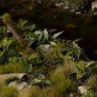 Woodland diorama featuring Laser Plants Lords-and-Ladies, showcasing realistic forest floor scene 
