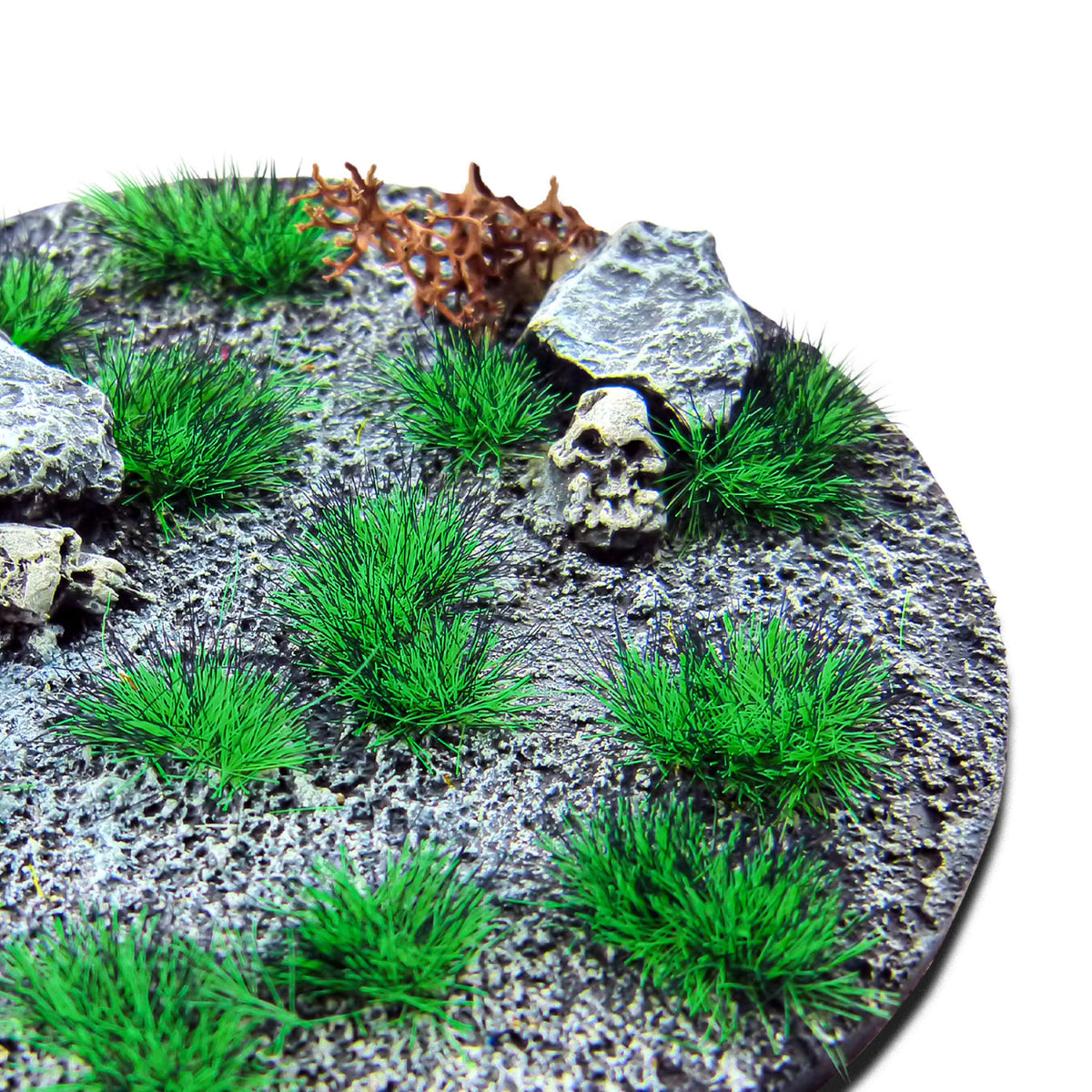 Fluor Wildfire Green Martian Fluor Tufts planted on a grey textured base with a skull and rocks