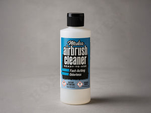 Studio shot of Medea Iwata Airbrush Cleaner 8oz with neutral background