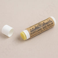 Open Medea Thread Sealer tube with natural beeswax formula for airbrush maintenance
