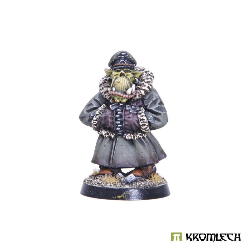 Kromlech Orc Commissar painted: an orc officer in a grey-green greatcoat, fur collar and peaked cap, front view