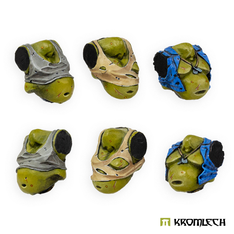 The six painted Fatties torsos turned to show their sides and neck sockets