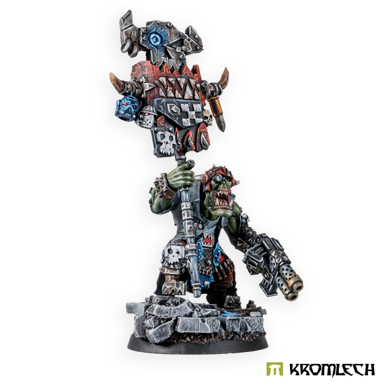 The painted banner bearer seen three-quarter on, gun held low