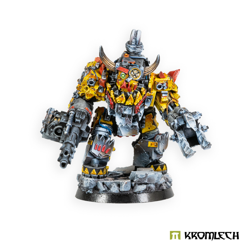 Kromlech Orc Juggernaut Mecha-Armour painted: a yellow armoured orc with a heavy machine gun and a crusher claw
