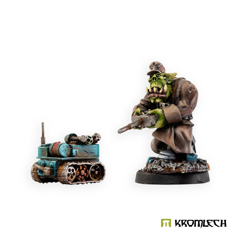 Kromlech Orc Operator and Goliath Mine painted: a kneeling orc in a brown greatcoat beside a small tracked mine