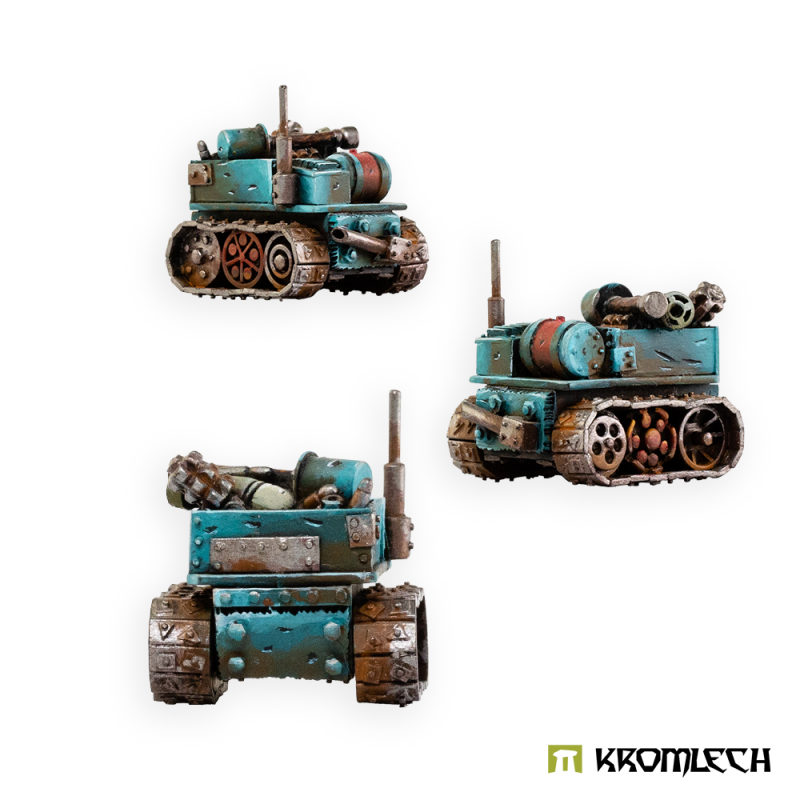 Three painted views of the tracked Goliath mine in teal with rusty tracks and an aerial
