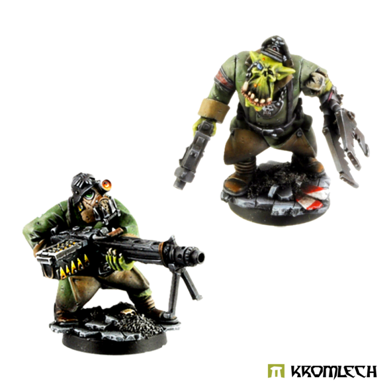 The painted squad leader with a mechanical claw, beside the kneeling machine gunner