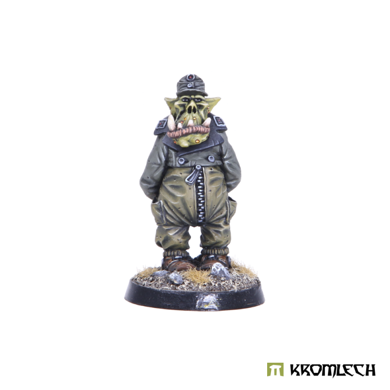 Kromlech Orc Tank Driver painted: orc in a field cap, short jacket and zipped overalls, hands in his pockets