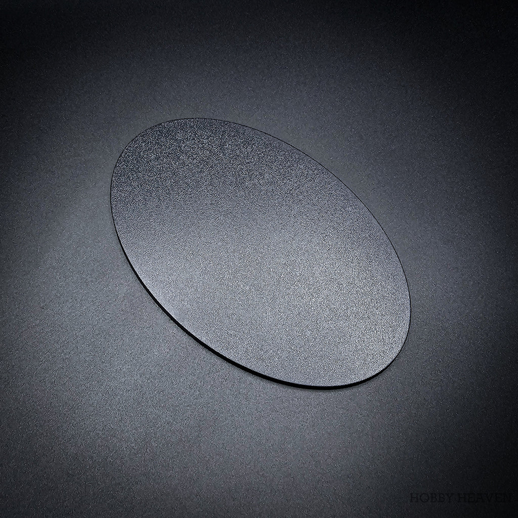 Oval 170x105 mm ABS miniature base with textured surface for secure model mounting