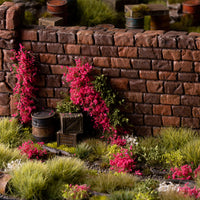 Lifelike diorama featuring Pink Flowers - Wild tufts, showcasing a charming landscape with varied textures, including rose gardens, blooming shrubs, and wild heathland flowers
