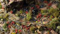 Scenic diorama decorated with red Poppy Tiny Flowers tufts among grass and terrain

