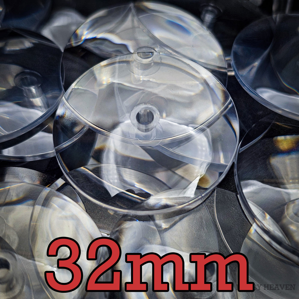 Premium 32mm clear bases and flying stems set on black background - PS plastic bases with PC plastic stems for superior durability