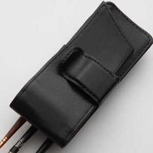 Back view of Raphael Le Voyageur protective black leather case for travel brushes