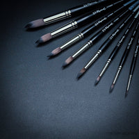 Close-up of Raphaël Softaqua 845 round brushes showing fine pointed synthetic squirrel tips for detailed watercolour work
