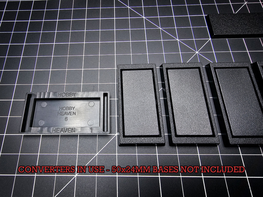 Rectangle base converter 50x24mm to 60x30mm – demonstration on cutting mat – Hobby Heaven
