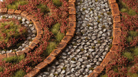 Red Camellia Flowers tufts applied on scenic diorama terrain with stone path and grass
