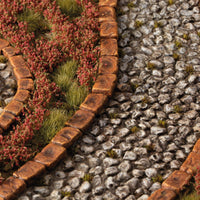 Red Camellia Flowers tufts applied on scenic diorama terrain with stone path and grass