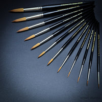 Red Dot Designers Brushes full set angled view on black background
