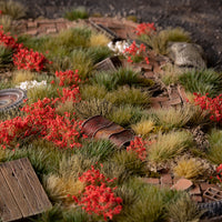 Lifelike diorama featuring Red Flowers - Wild tufts, showcasing a vibrant landscape with varied textures, including bold garden flowers and wild berry-bearing shrubs
