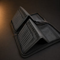 Rosemary & Co black nylon brush case opened empty in standing easel position with two upright brush storage panels
