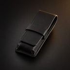 Rosemary & Co black leather 3 pocket brush wallet shown closed for storing pocket travel brushes