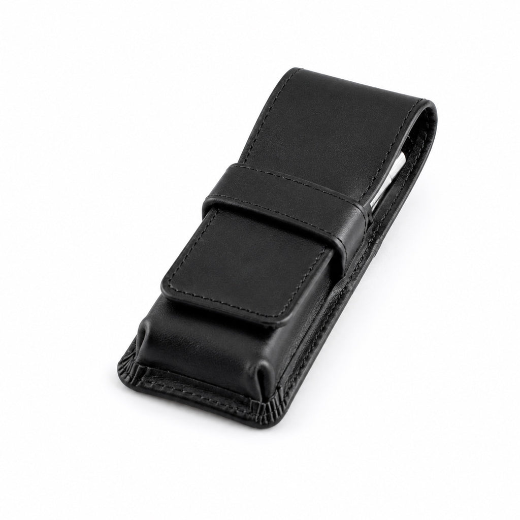 Closed Rosemary & Co black leather travel brush wallet with fold-over flap and tuck strap